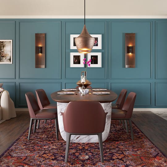 Open_plan_dining_living_kitchen_with_teal_panelled_walls_and_wooden_floors.jpg