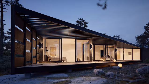 Glass-fronted coastal house with warm interior lighting at dusk.